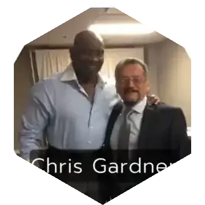 Edmundo Velasco junto a Chris Gardner